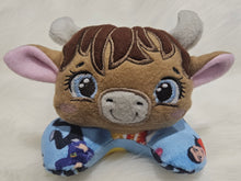 Tummy time highland cow