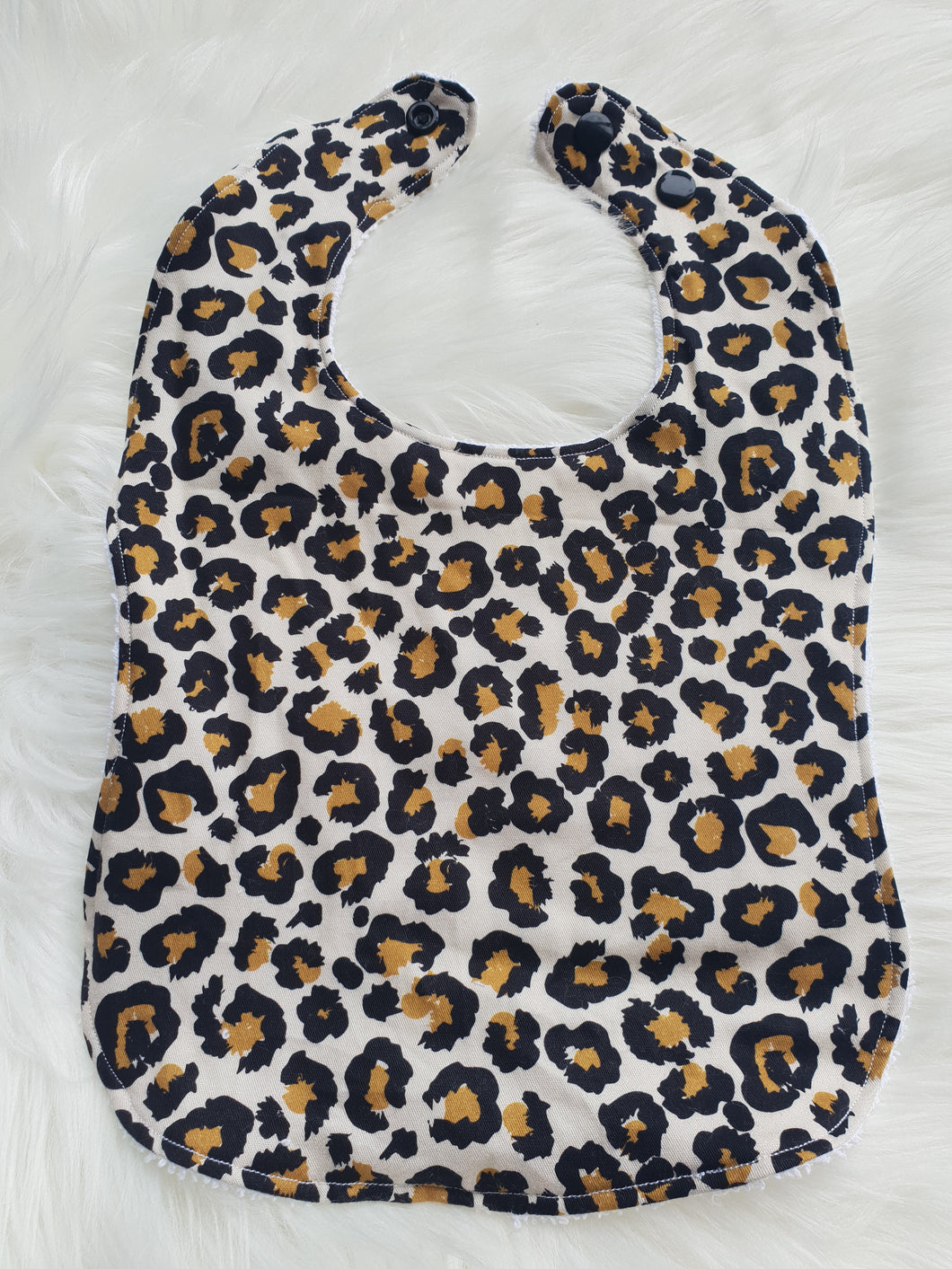 Leopard print feeding bib